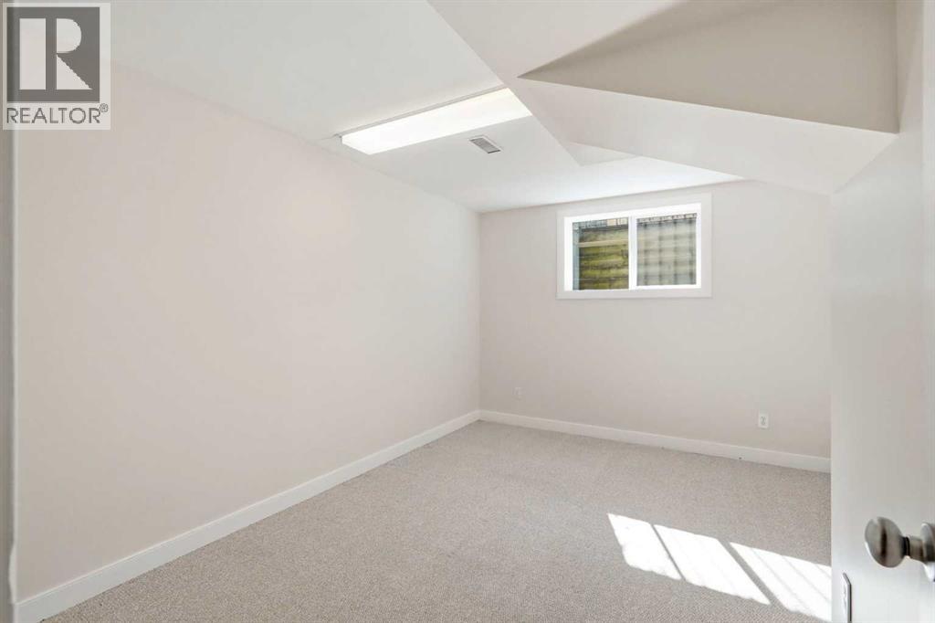 4108 Gatefield Avenue SW, Calgary, Alberta  T3E 4C5 - Photo 39 - A2311873