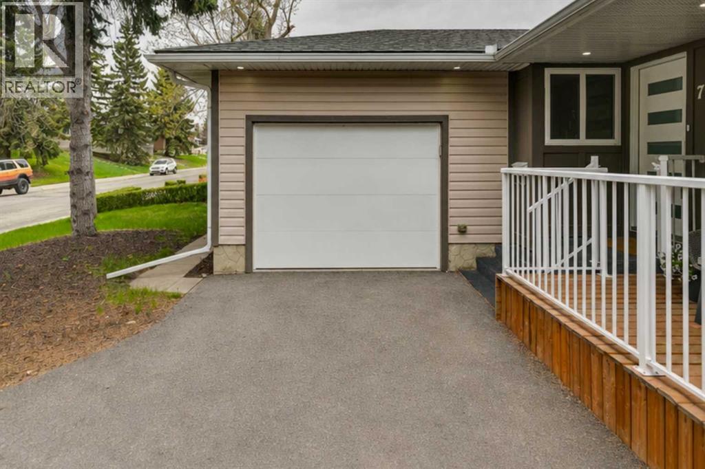 7116 Hunterwood Road NW, Calgary, Alberta  T2K 4J6 - Photo 41 - A2311232