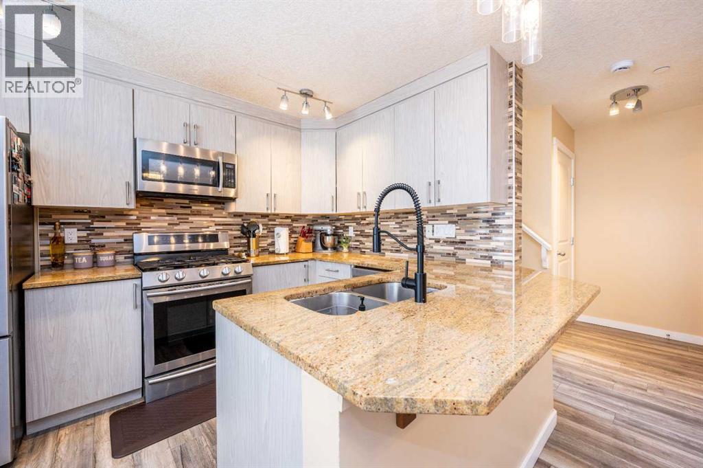 60 Covecreek Mews NE, Calgary, Alberta  T3J 4V9 - Photo 11 - A2284975