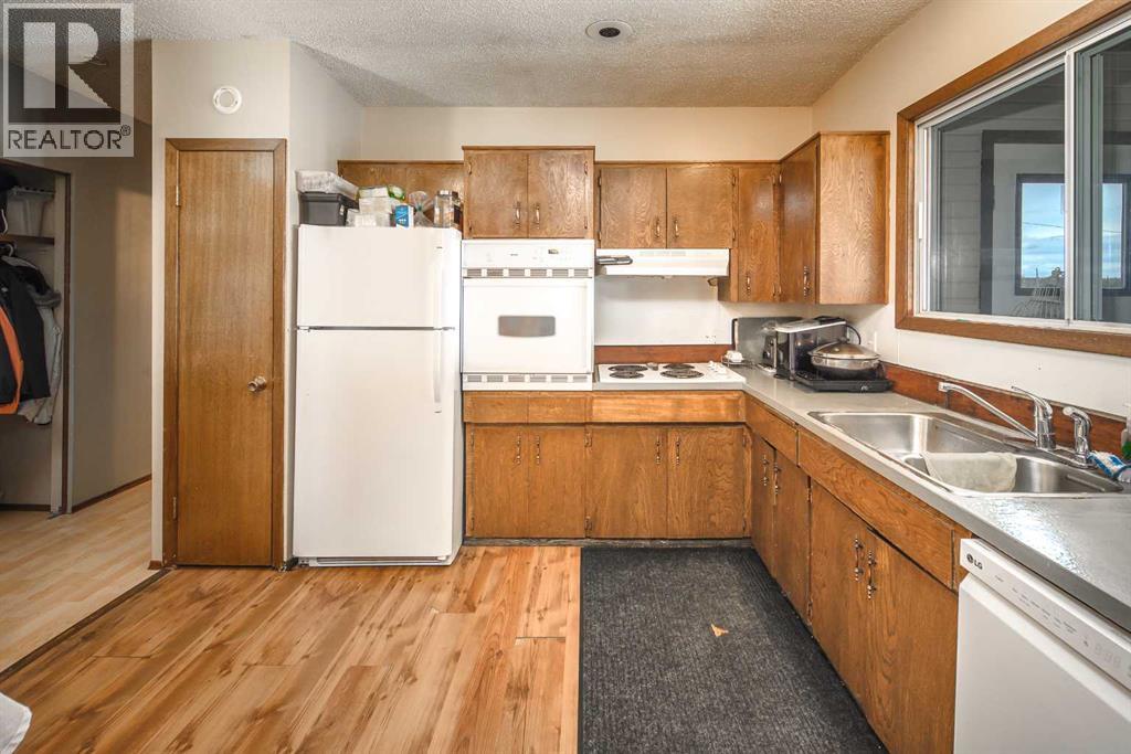 262057 Poplar Hill Drive, Rural Rocky View County, Alberta  T3R 1C7 - Photo 10 - A2308159