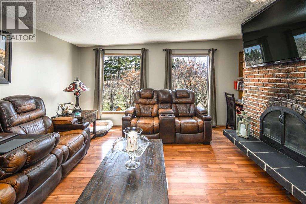 262057 Poplar Hill Drive, Rural Rocky View County, Alberta  T3R 1C7 - Photo 6 - A2308159