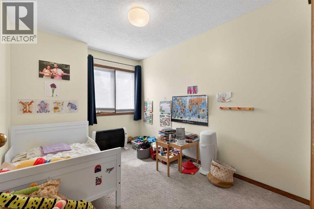 1328 48 Avenue NW, Calgary, Alberta  T2K 6B8 - Photo 19 - A2310680