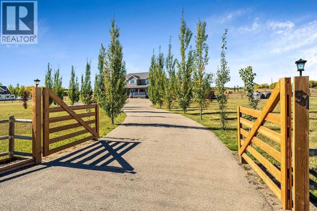 51 Norris Coulee Trail, De Winton, Alberta  T1S 5A5 - Photo 3 - A2267806