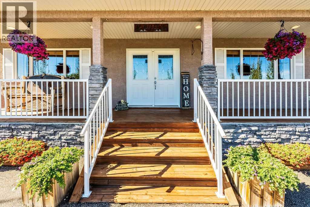 51 Norris Coulee Trail, De Winton, Alberta  T1S 5A5 - Photo 5 - A2267806
