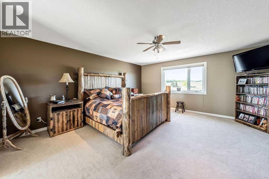51 Norris Coulee Trail, De Winton, Alberta  T1S 5A5 - Photo 25 - A2267806