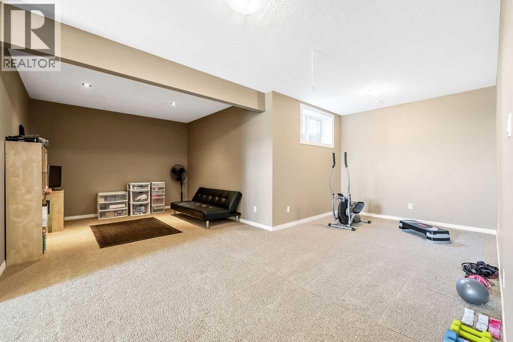 51 Norris Coulee Trail, De Winton, Alberta  T1S 5A5 - Photo 40 - A2267806