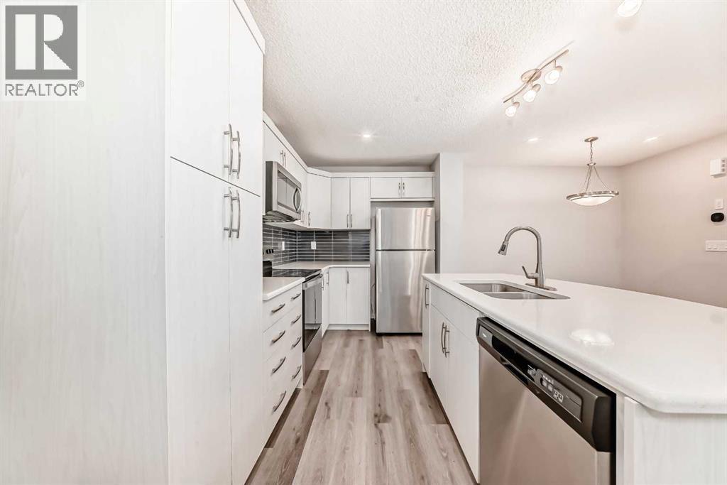 1337 140 Avenue NW, Calgary, Alberta  T2K 0E3 - Photo 6 - A2275880