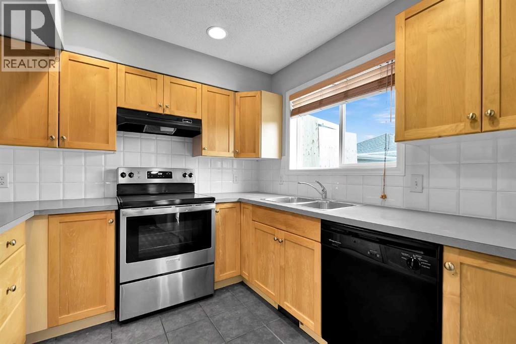 164 Bridleridge Gardens SW, Calgary, Alberta  T2Y 4L4 - Photo 8 - A2308685