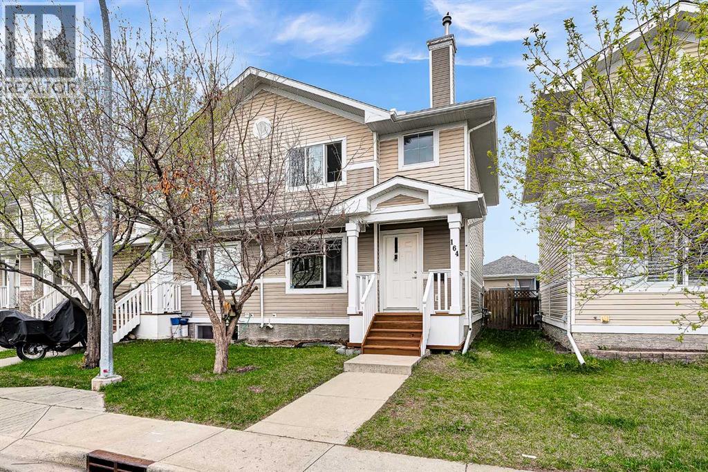 164 Bridleridge Gardens SW, Calgary, Alberta  T2Y 4L4 - Photo 1 - A2308685