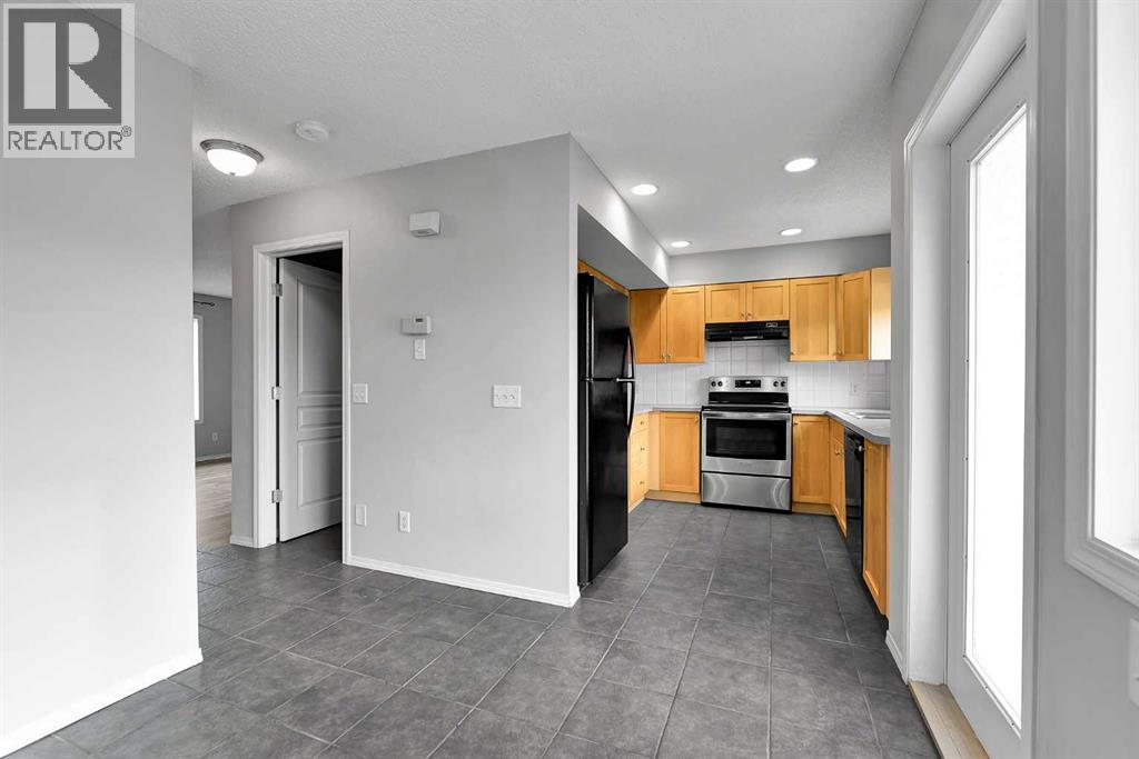 164 Bridleridge Gardens SW, Calgary, Alberta  T2Y 4L4 - Photo 6 - A2308685