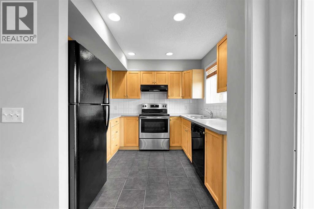 164 Bridleridge Gardens SW, Calgary, Alberta  T2Y 4L4 - Photo 7 - A2308685