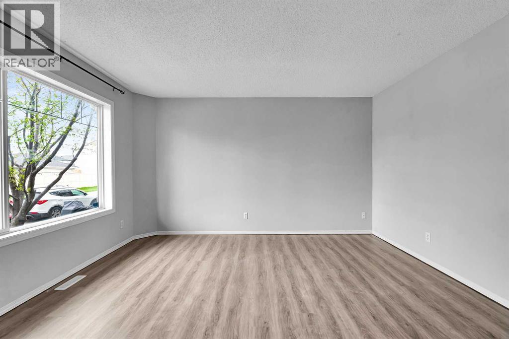 164 Bridleridge Gardens SW, Calgary, Alberta  T2Y 4L4 - Photo 3 - A2308685