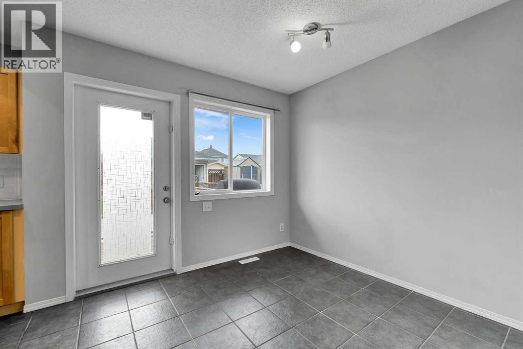 164 Bridleridge Gardens SW, Calgary, Alberta  T2Y 4L4 - Photo 9 - A2308685