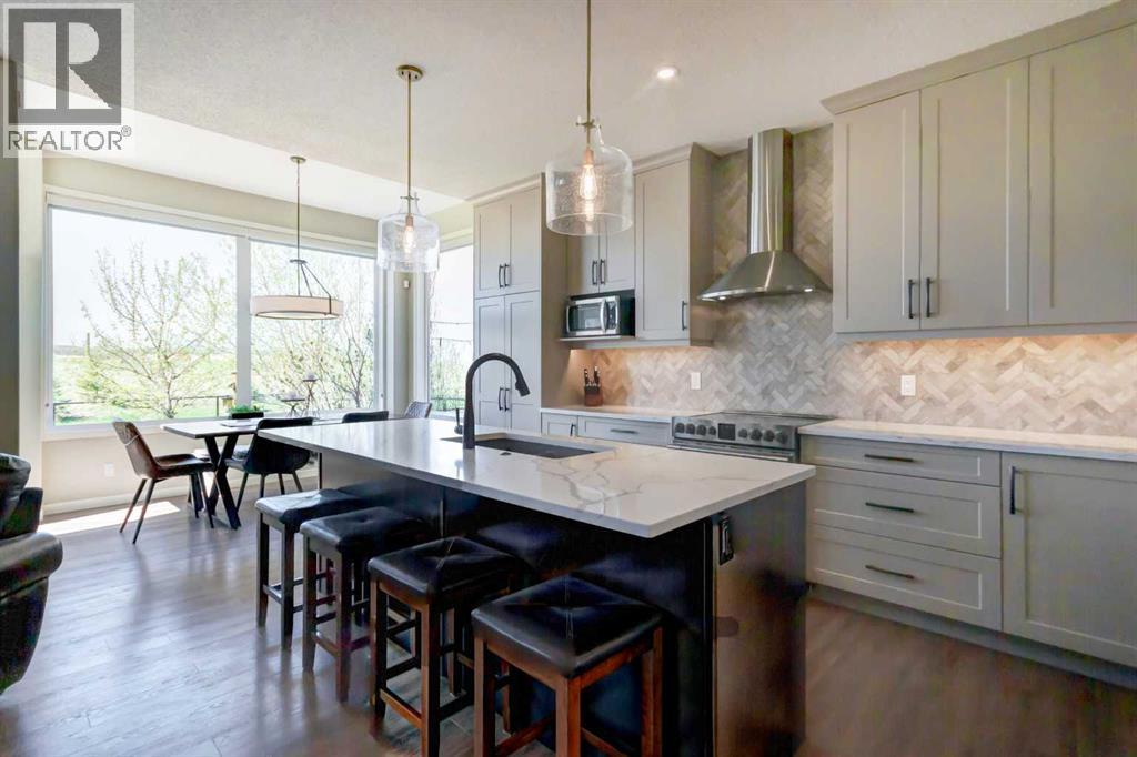 143 Cougarstone Court SW, Calgary, Alberta  T3H 5R4 - Photo 3 - A2308494