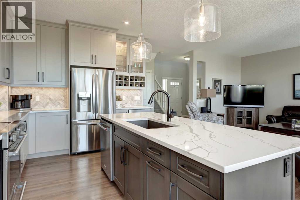 143 Cougarstone Court SW, Calgary, Alberta  T3H 5R4 - Photo 5 - A2308494