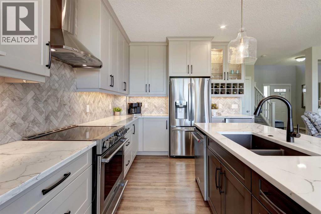 143 Cougarstone Court SW, Calgary, Alberta  T3H 5R4 - Photo 6 - A2308494