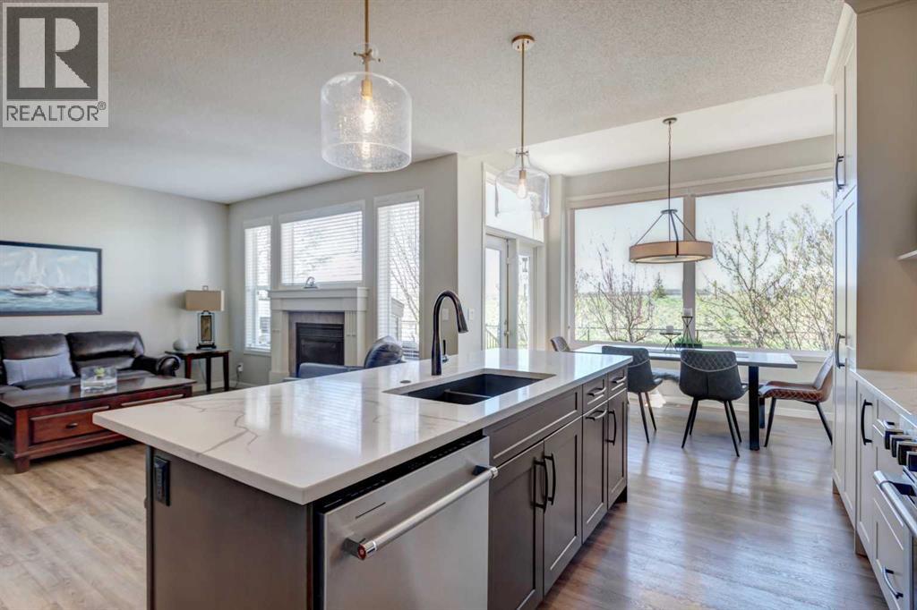 143 Cougarstone Court SW, Calgary, Alberta  T3H 5R4 - Photo 7 - A2308494