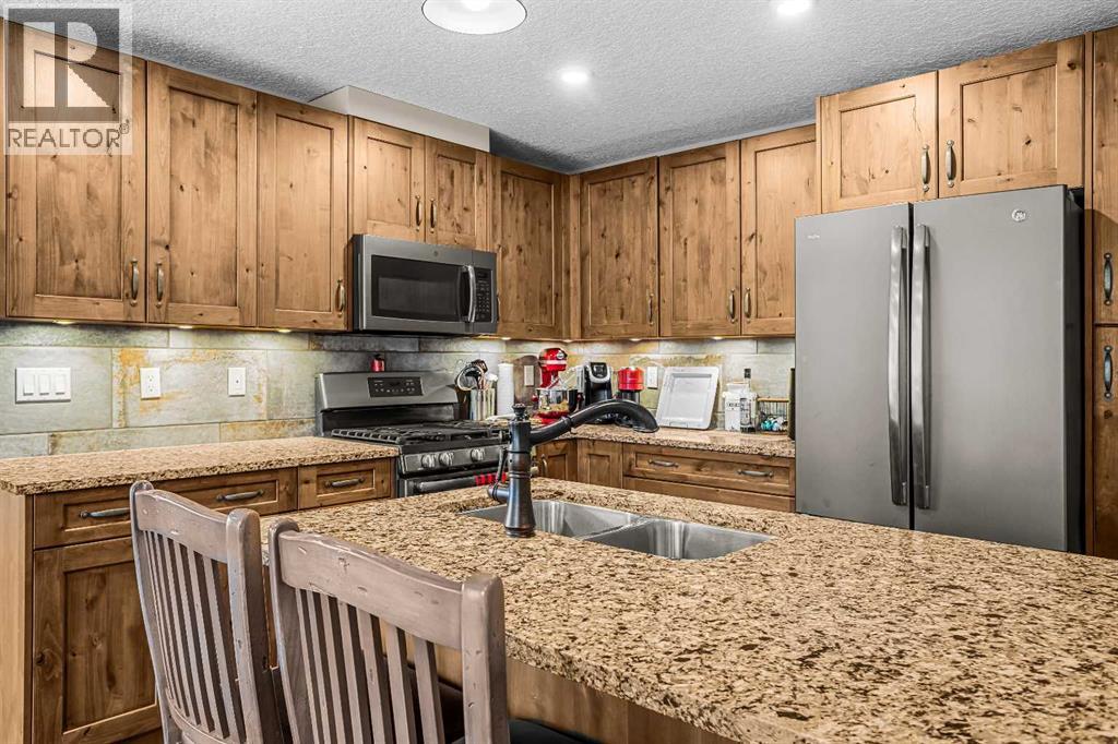303, 102 Stewart Creek, Canmore, Alberta  T1W 0E3 - Photo 23 - A2311429