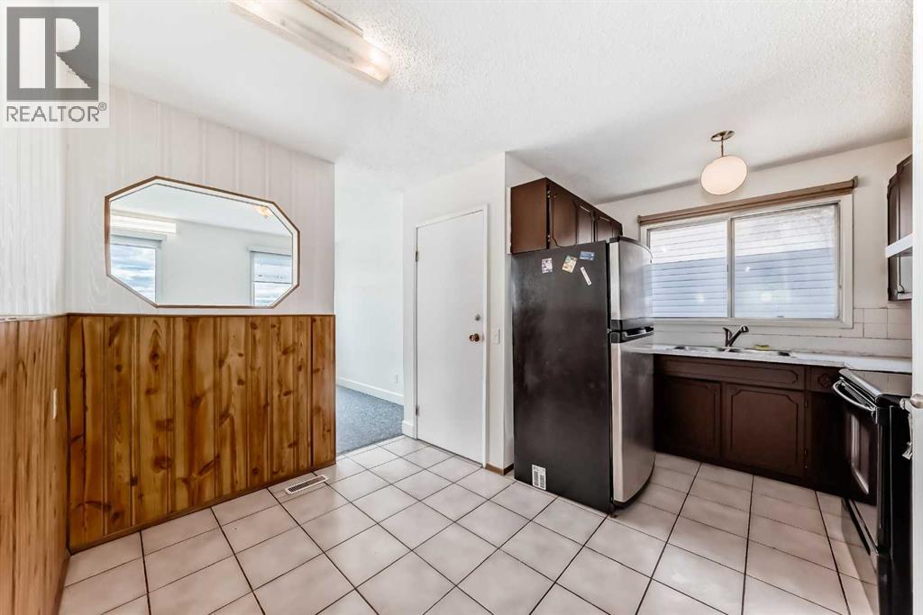 703 58 Street Se, Calgary, Alberta  T2A 3S3 - Photo 4 - A2310063