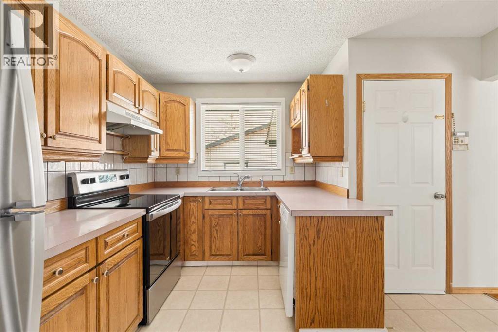 404 Manora Way NE, Calgary, Alberta  T2A 4R4 - Photo 16 - A2303893