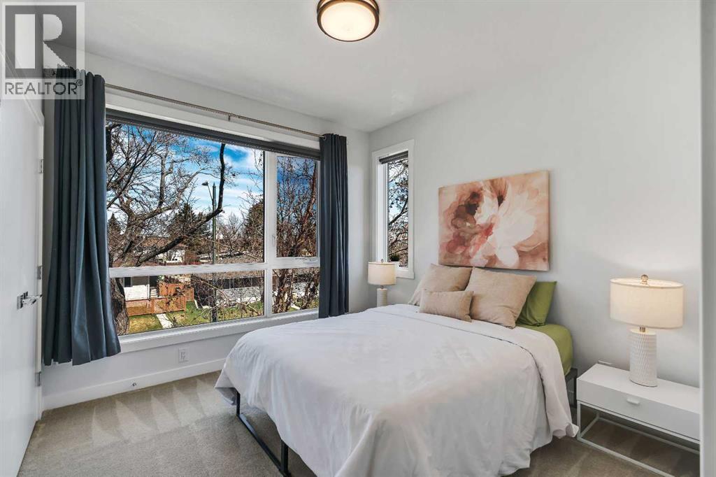 947 31 Avenue Nw, Calgary, Alberta  T2K 0A6 - Photo 21 - A2304183