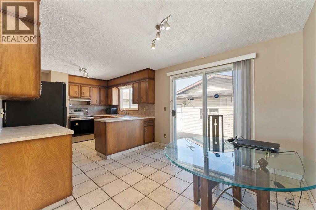 7003 Temple Drive Ne, Calgary, Alberta  T1Y 4Z4 - Photo 10 - A2307481