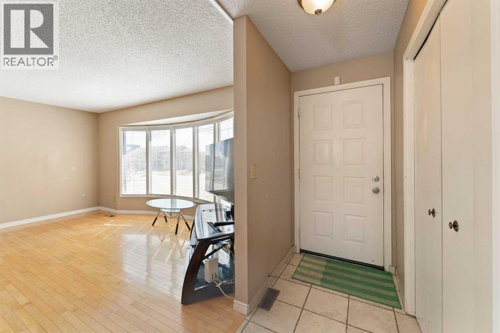 7003 Temple Drive Ne, Calgary, Alberta  T1Y 4Z4 - Photo 3 - A2307481