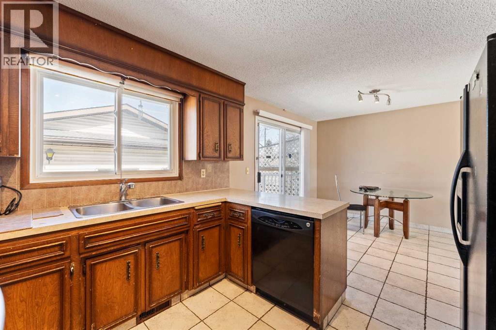 7003 Temple Drive Ne, Calgary, Alberta  T1Y 4Z4 - Photo 7 - A2307481