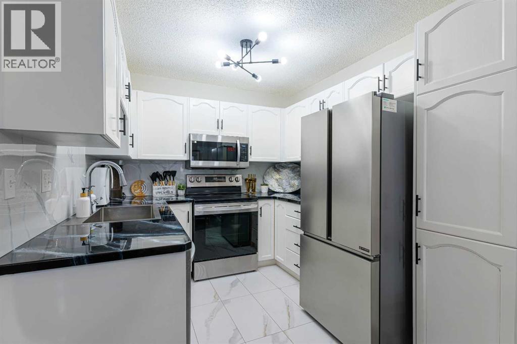 13 Mt Aberdeen Manor SE, Calgary, Alberta  T2Z 3N8 - Photo 7 - A2308888