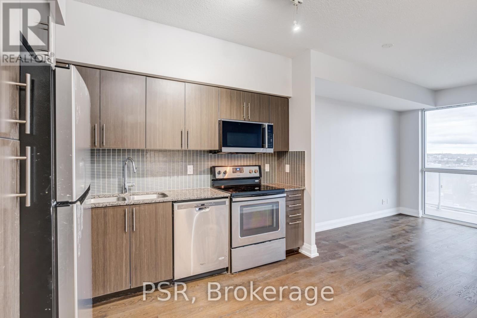 602 - 65 Speers Road, Oakville, Ontario  L6K 0J1 - Photo 6 - W12926752