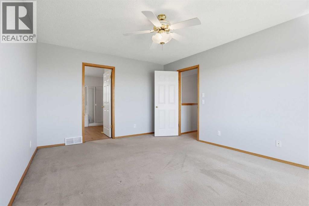 93 Somerglen Park SW, Calgary, Alberta  T2Y 3M5 - Photo 24 - A2308162