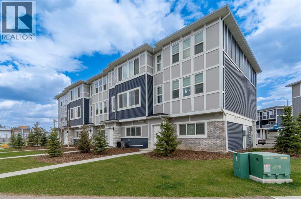 203, 33 Merganser Drive, Chestermere, Alberta  T1X 2S3 - Photo 1 - A2311736