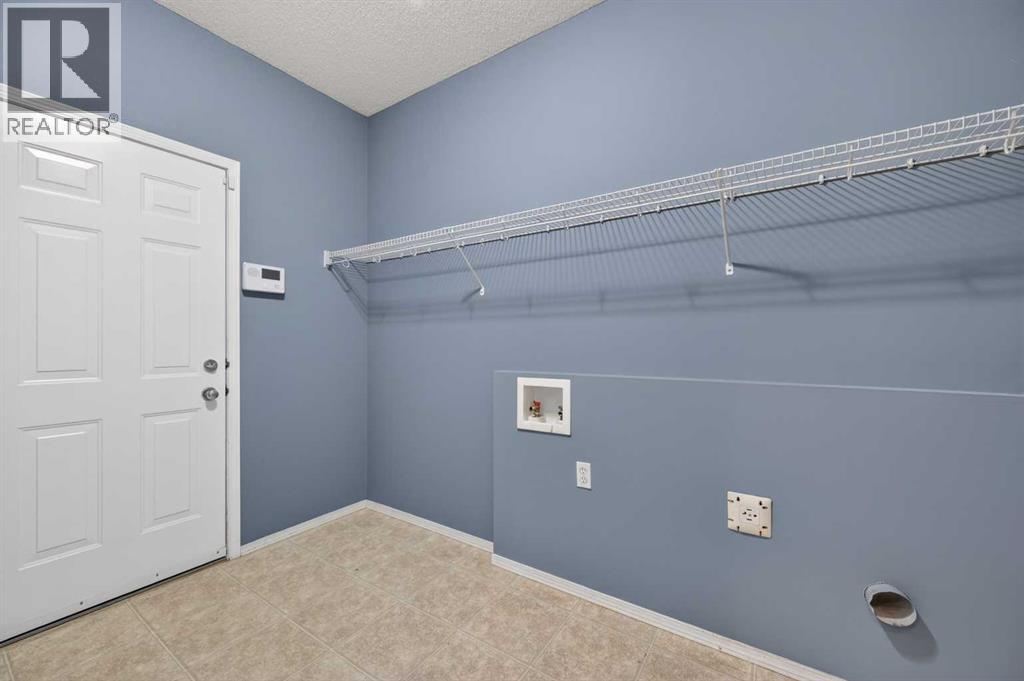 99 Evansbrooke Manor Nw, Calgary, Alberta  T2P 1C9 - Photo 17 - A2301438