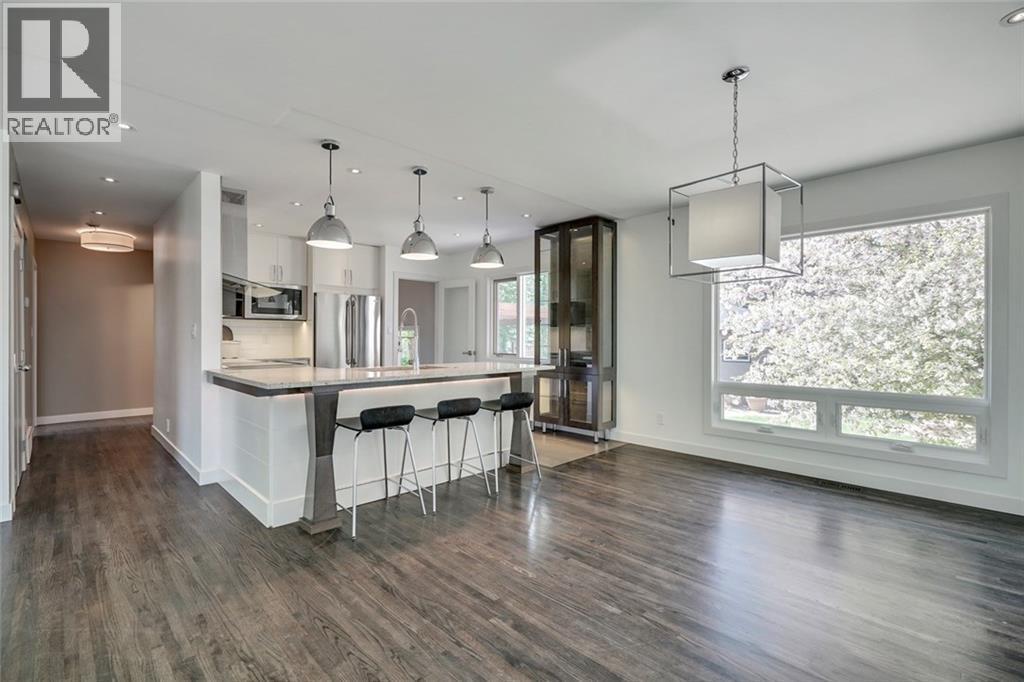 2203 25 Avenue NW, Calgary, Alberta  T2M 2C2 - Photo 4 - A2311804