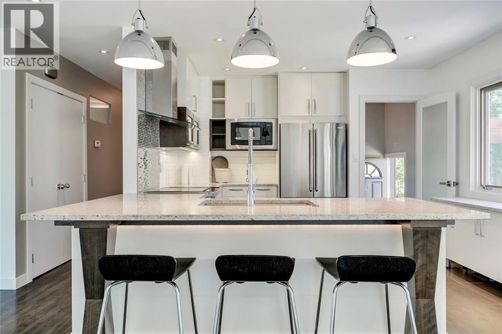 2203 25 Avenue NW, Calgary, Alberta  T2M 2C2 - Photo 6 - A2311804