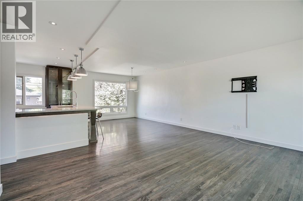 2203 25 Avenue NW, Calgary, Alberta  T2M 2C2 - Photo 11 - A2311804
