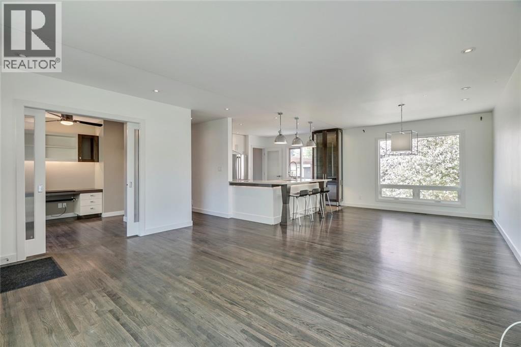 2203 25 Avenue NW, Calgary, Alberta  T2M 2C2 - Photo 3 - A2311804