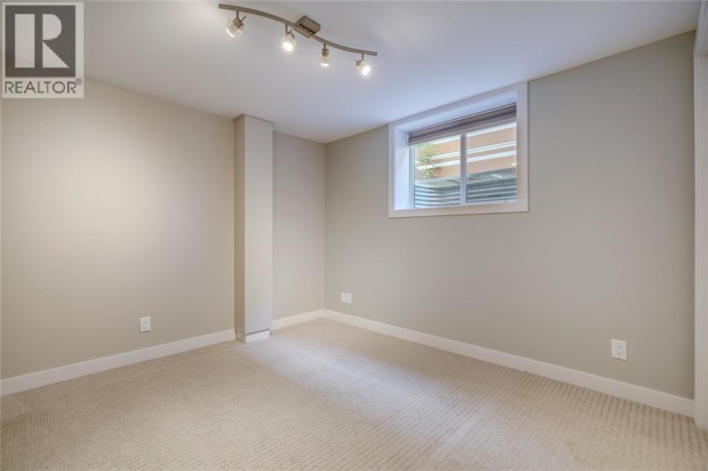 2203 25 Avenue NW, Calgary, Alberta  T2M 2C2 - Photo 23 - A2311804