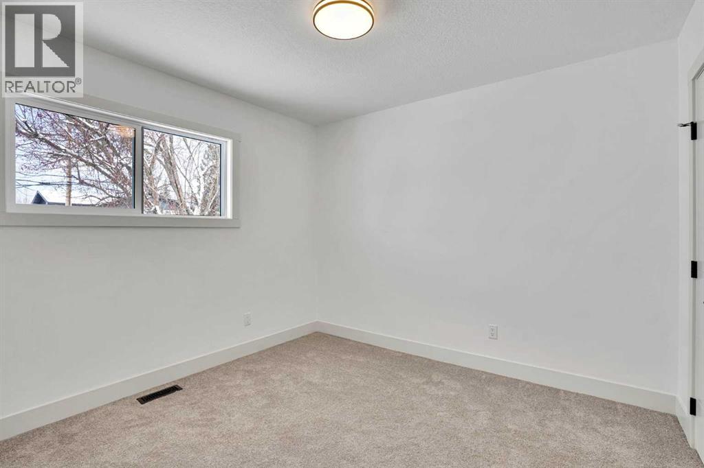 908 Stonehaven Road SW, Calgary, Alberta  T2W 0P6 - Photo 25 - A2308929