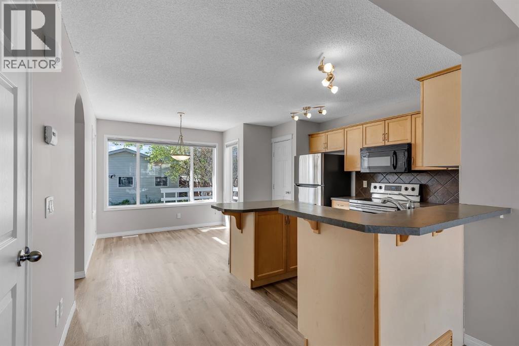 1813 Sagewood Link SW, Airdrie, Alberta  T4B 3B3 - Photo 5 - A2308701