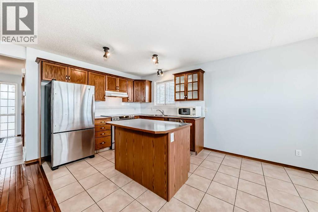 42 Harvest Rose Place NE, Calgary, Alberta  T3K 4M6 - Photo 9 - A2307859