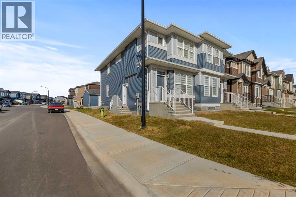 281 Creekside Boulevard SW, Calgary, Alberta  T2X 4X9 - Photo 1 - A2304798