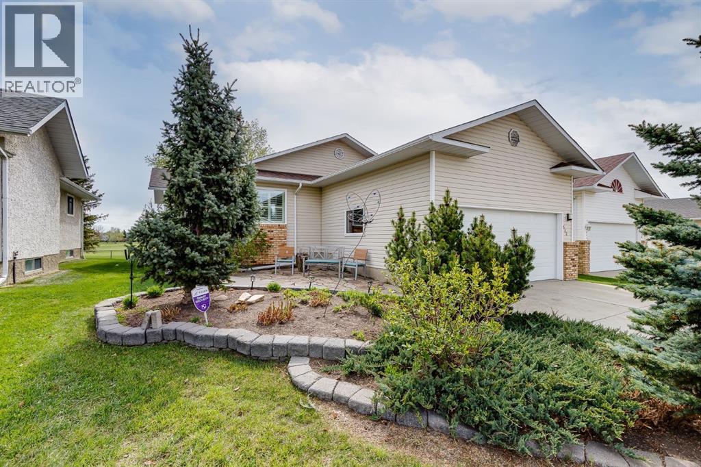512 Woodside Drive Nw, Airdrie, Alberta  T4B 2C6 - Photo 4 - A2308172