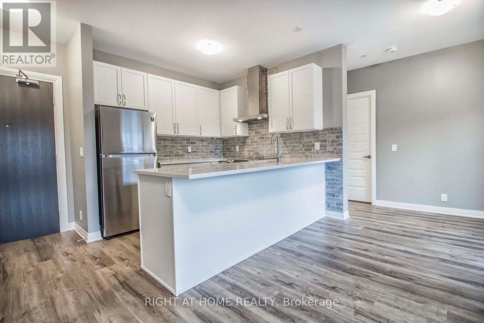 206 - 102 Grovewood Common Circle, Oakville, Ontario  L6H 0X2 - Photo 4 - W13140308