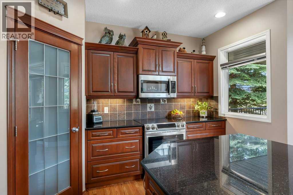 101 Valley Creek Place NW, Calgary, Alberta  T3B 5V1 - Photo 12 - A2309773