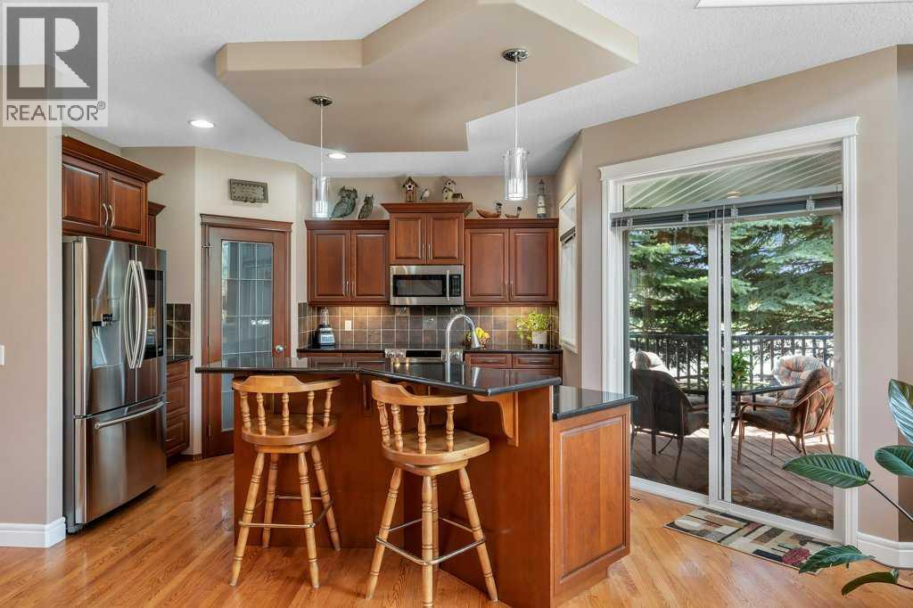 101 Valley Creek Place NW, Calgary, Alberta  T3B 5V1 - Photo 11 - A2309773