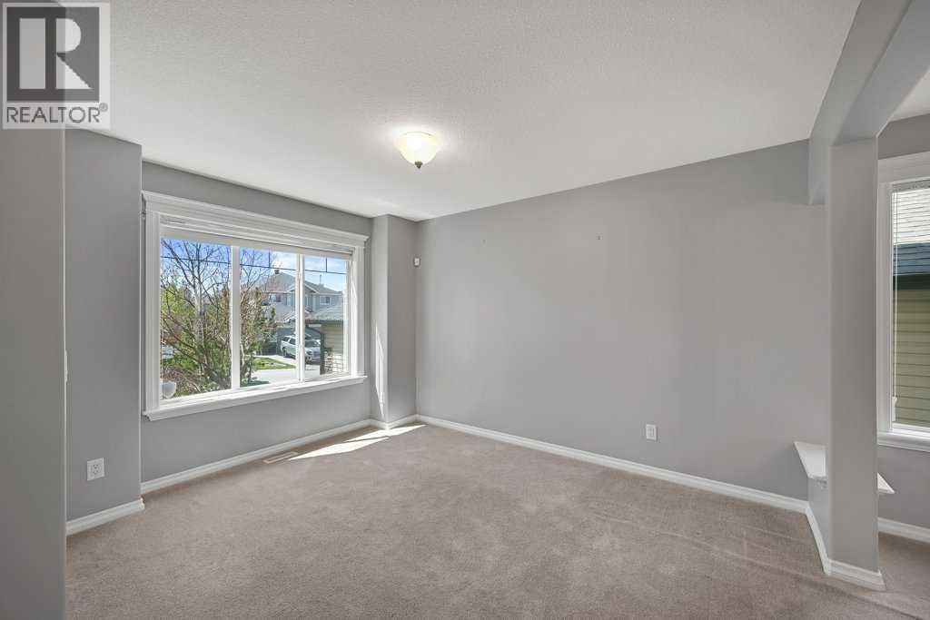 8 Valley Creek Crescent NW, Calgary, Alberta  T3B 5V2 - Photo 6 - A2310883