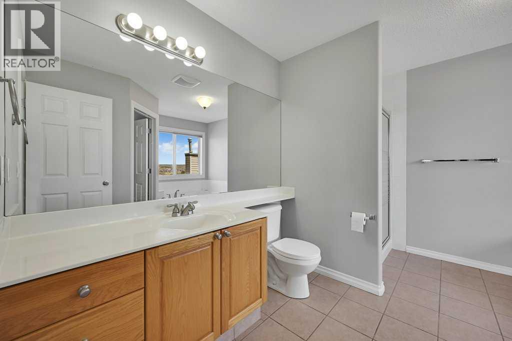 8 Valley Creek Crescent NW, Calgary, Alberta  T3B 5V2 - Photo 22 - A2310883