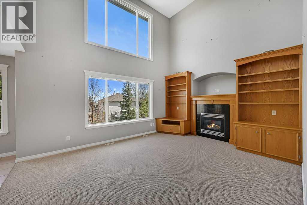 8 Valley Creek Crescent NW, Calgary, Alberta  T3B 5V2 - Photo 9 - A2310883