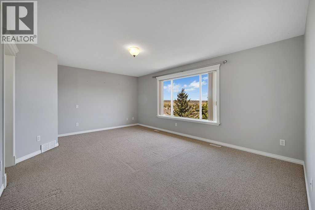8 Valley Creek Crescent NW, Calgary, Alberta  T3B 5V2 - Photo 20 - A2310883